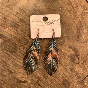 Brand new feather earrings